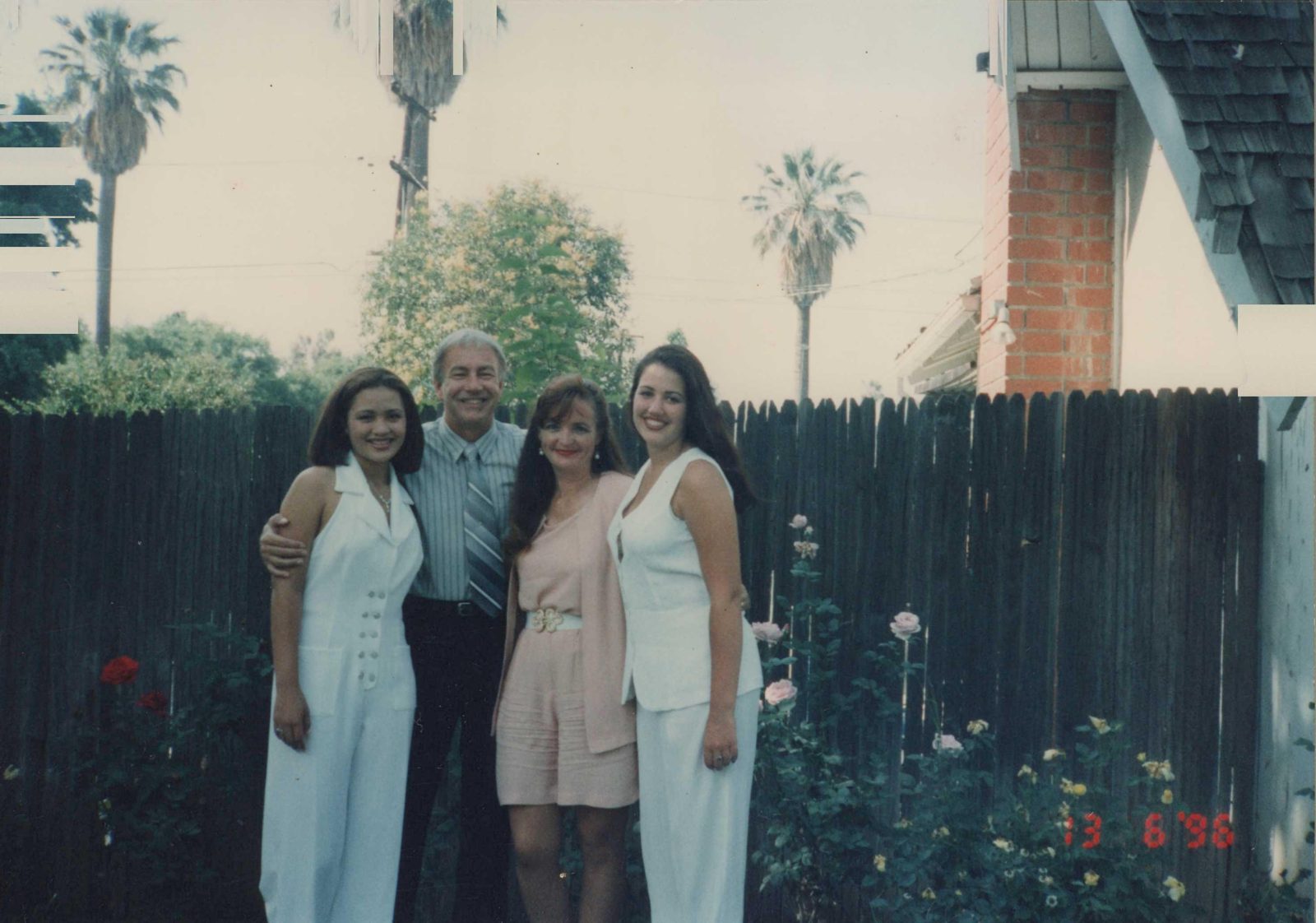 Robert Harmon with family in the backyard, 1998