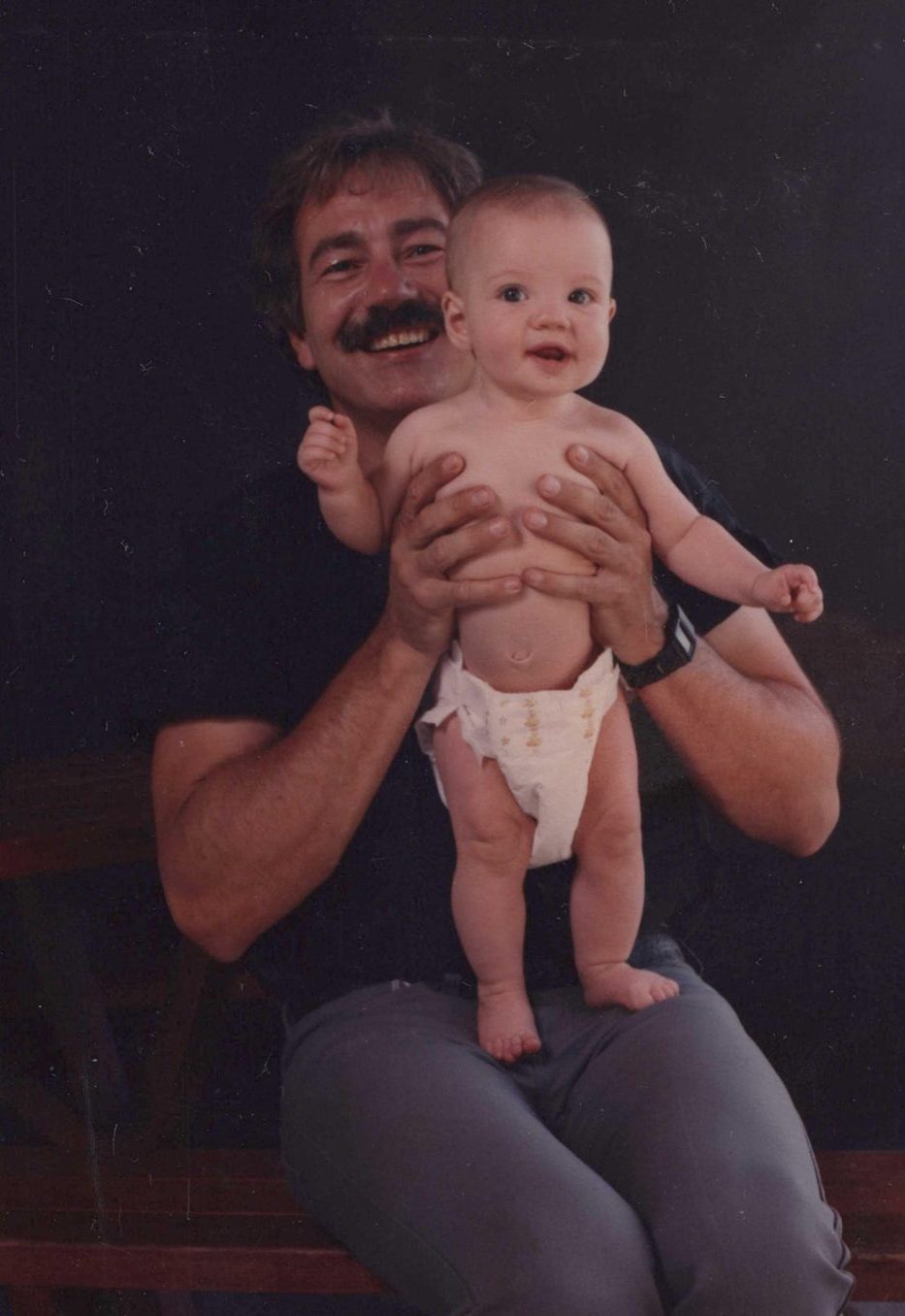 Robert Harmon holding baby Melonie
