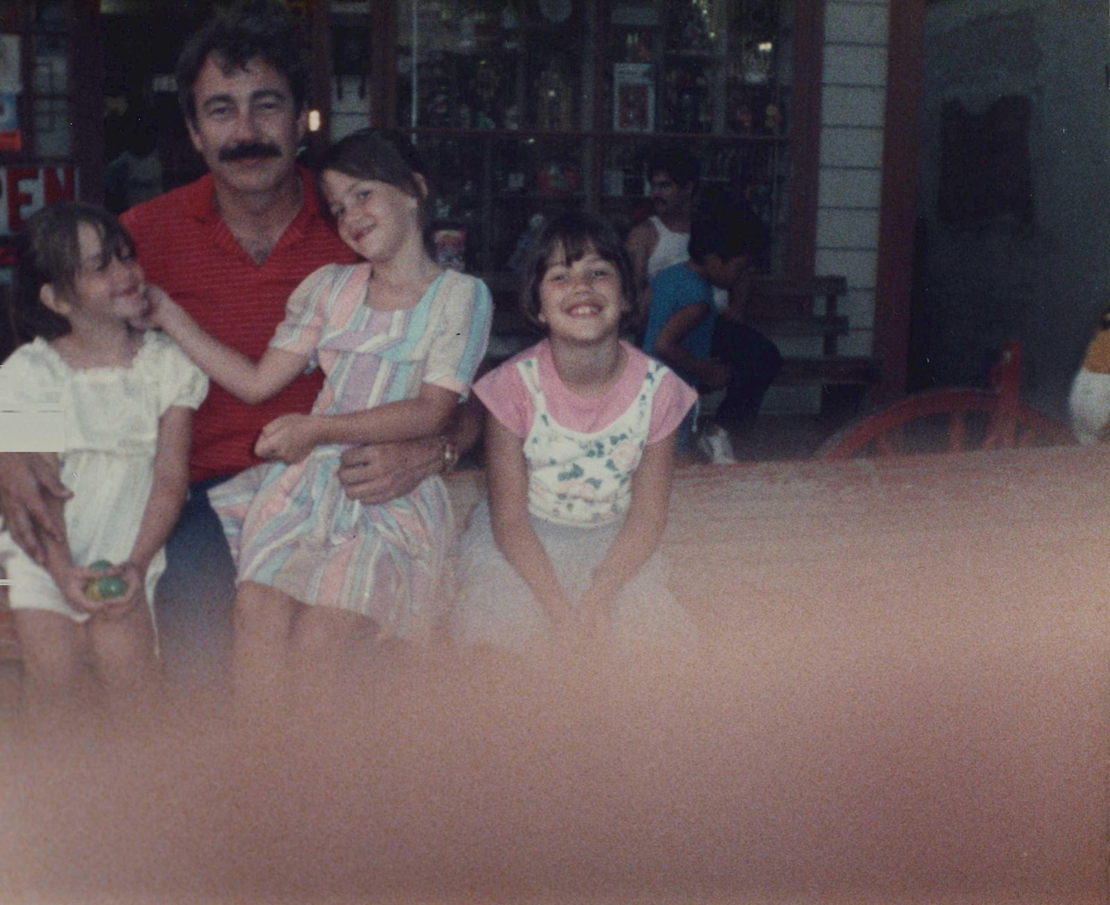 Robert Harmon with his daughters